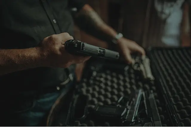 Home Page 17 person loading handgun